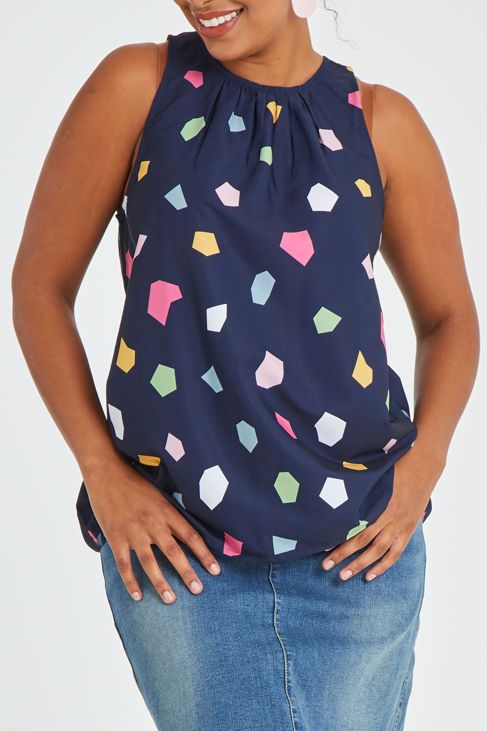 Model Noli wearing size 14 of the Sleeveless Tank in colour Jigsaw (Blue), from the front, cropped image