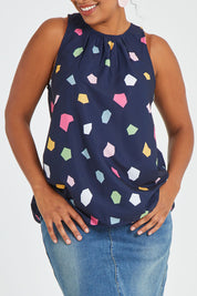 Model Noli wearing size 14 of the Sleeveless Tank in colour Jigsaw (Blue), from the front, cropped image
