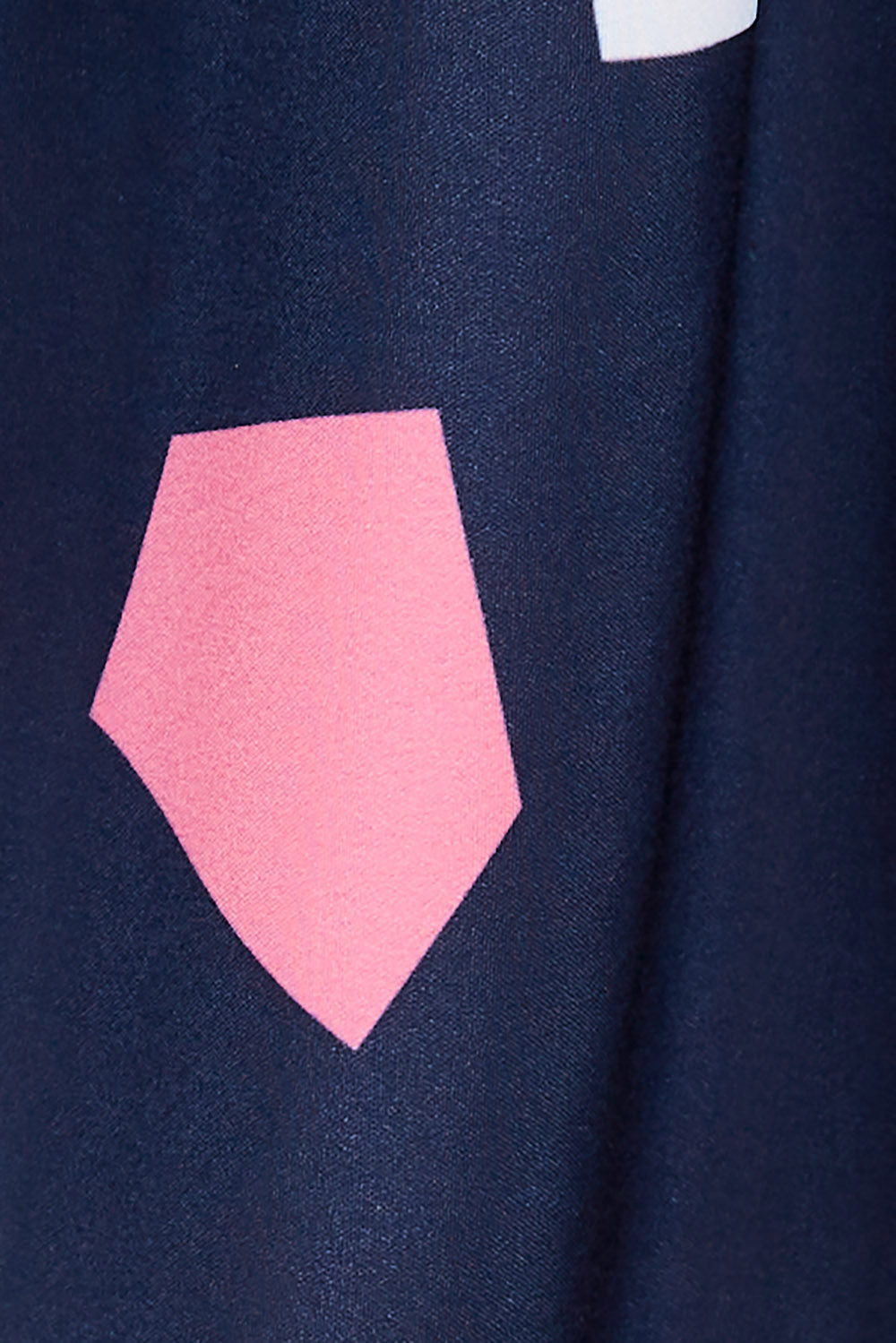 Product shot of the Sleeveless Tank in colour Jigsaw (Blue), detail