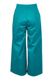 Product shot of the Wide Leg Pant in colour Turquoise (Blue), from the back