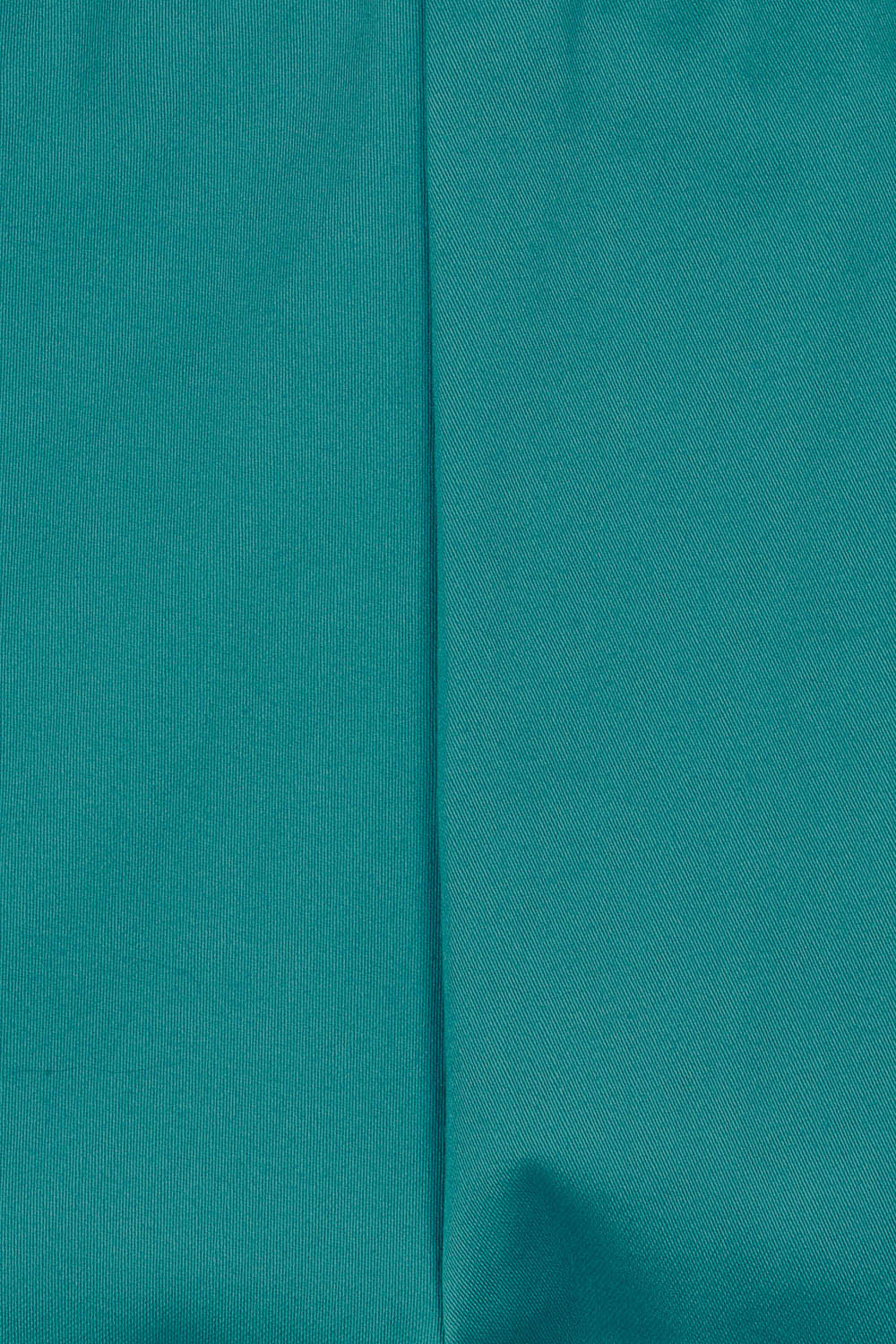 Product shot of the Wide Leg Pant in colour Turquoise (Blue), detail