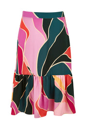 Product shot of the Flitter Skirt in colour Geo (Pink), from the front
