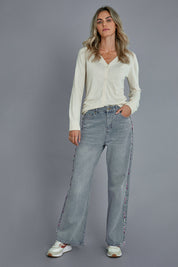 Model Alice wearing size 10 of the Patch Denim High Waisted Jeans in colour Denim (Blue), from the front, showing the whole outfit