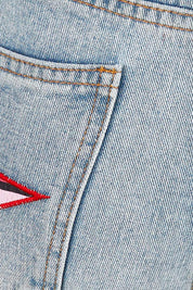 Product shot of the Patch Denim High Waisted Jeans in colour Denim (Blue), detail