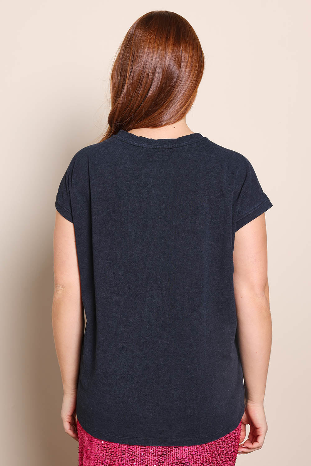 Model Georgiel wearing size 10 of the Heart Logo Tee – Blackpink in colour Blackpink, from the back