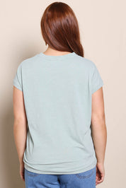 Model Georgiel wearing size 10 of the Heart Logo Tee – Tealred in colour Tealred, from the back