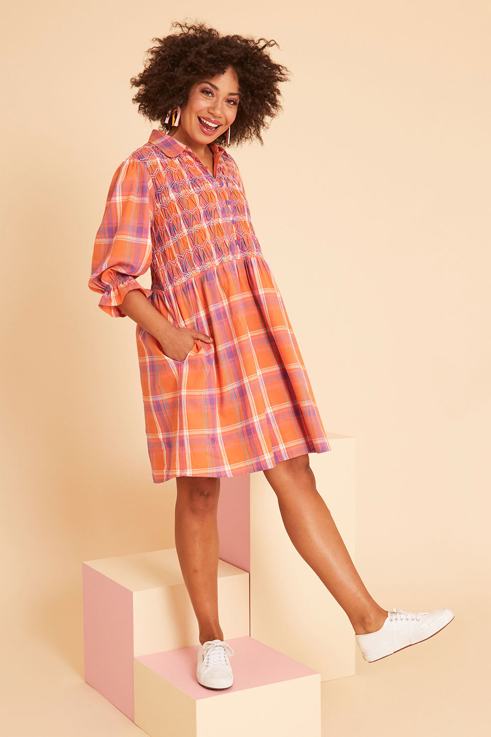 Model Olivia wearing size 10 of the Shirred Bodice Detail Dress in colour Checked, from the front, showing the whole outfit