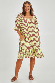 Model Monique wearing size 14 of the Stitch Detail Ruffle Sleeve Dress in colour Limechoc, from the front, showing the whole outfit