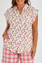 Model Monique wearing size 14 of the Cap Sleeve Shirt in colour Retrodaisy (White), from the front, cropped image