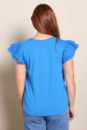 Model Georgiel wearing size 10 of the Ruffle Sleeve Top – Frenchblue in colour Frenchblue, from the back