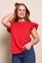 Model Georgiel wearing size 10 of the Ruffle Sleeve Top – Lollipop in colour Lollipop, in a cropped view