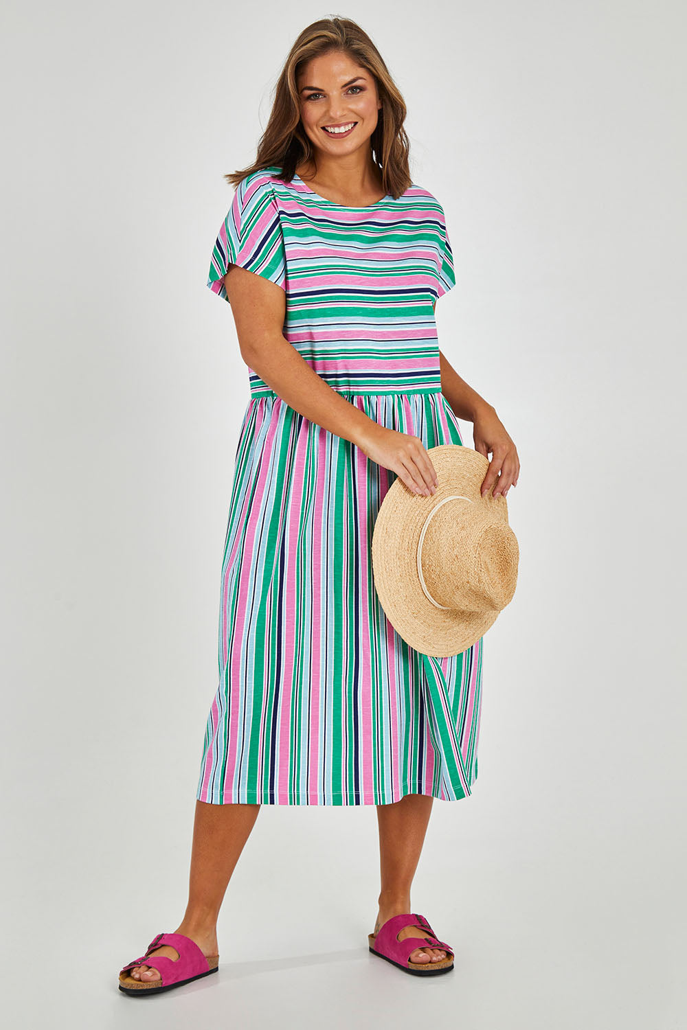 Model Monique wearing size 14 of the Stripe Slouch Dress in colour Striped (Green), from the front, showing the whole outfit