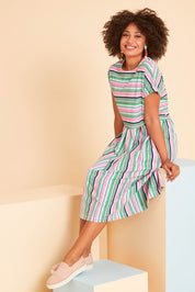 Model Olivia wearing size 10 of the Stripe Slouch Dress in colour Striped (Green), from the front, showing the whole outfit