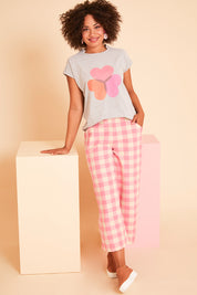 Model Olivia wearing size 10 of the Wide Leg Cropped Pant in colour Pinkcheck (Pink), from the front, showing the whole outfit