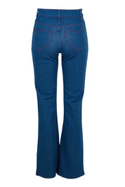 Product shot of the Bell Bottom Jeans in colour Middenim (Blue), from the back