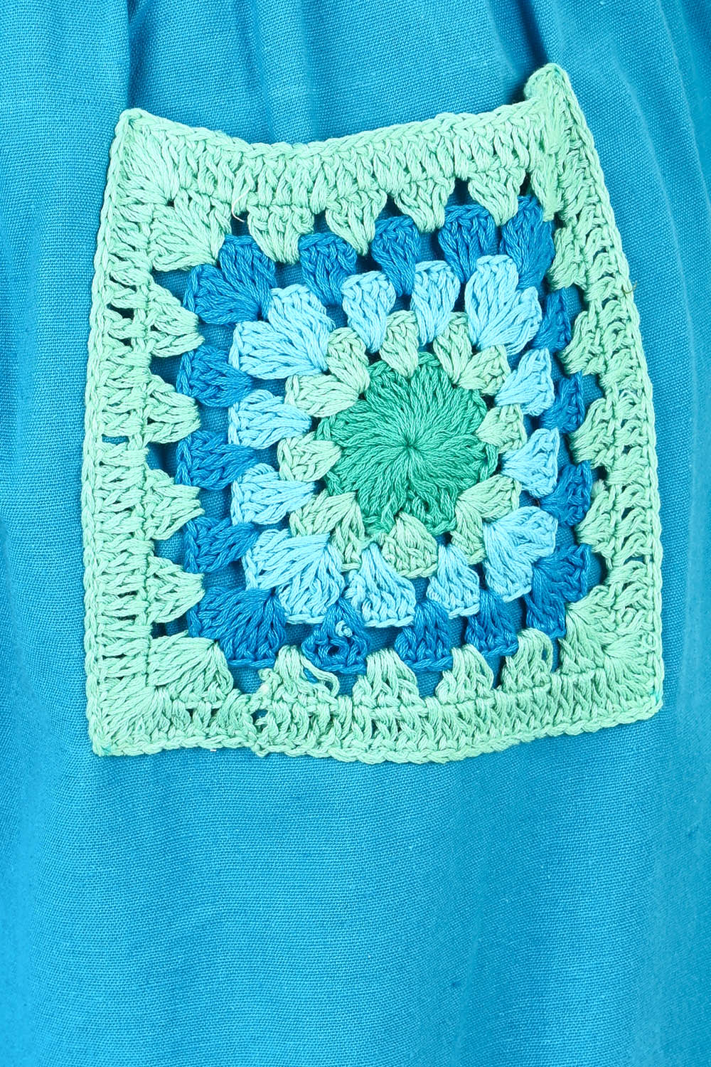 Product shot of the Crochet Pocket Cotton Pant in colour Oceanblue (Blue), detail