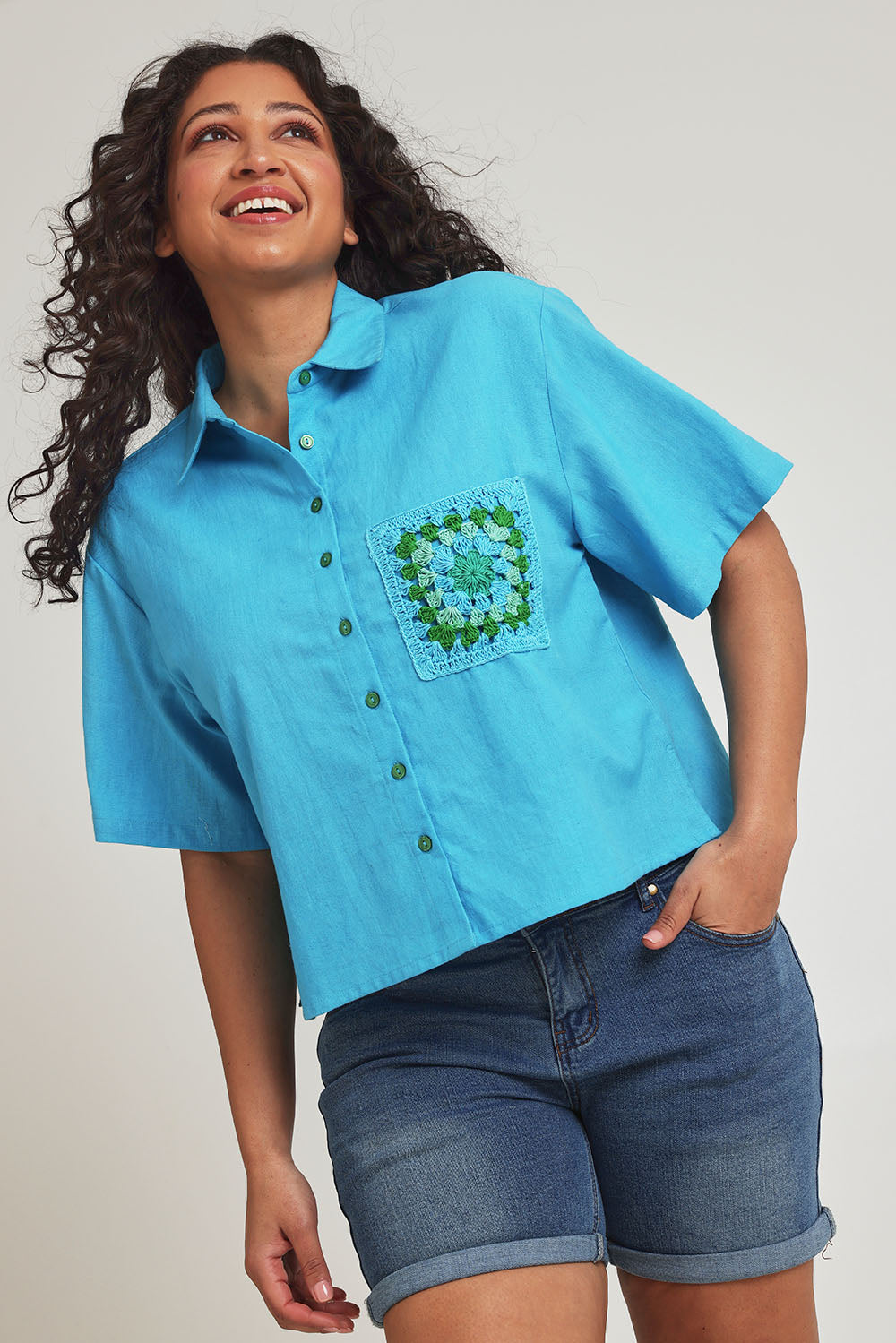 Model Terri-Leigh wearing size 14 of the Crochet Pocket Cotton Shirt in colour Skyblue (Blue), from the front, cropped image