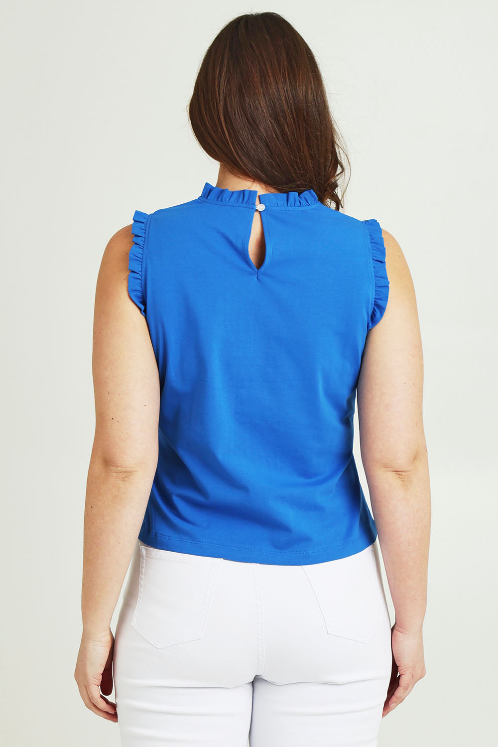 Model Jane wearing size 14 of the Cotton Frill Tank in colour Blue (Blue), from the back
