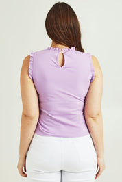 Model Jane wearing size 14 of the Cotton Frill Tank in colour Lilac (Purple), from the back