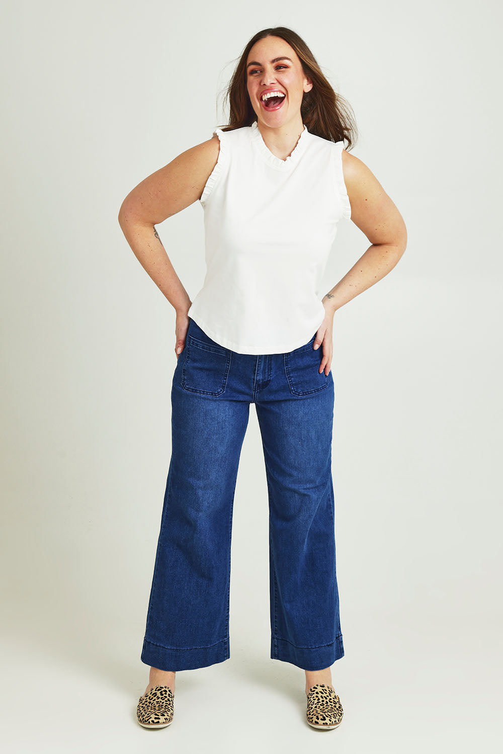 Model Jane wearing size 14 of the Cotton Frill Tank in colour White (White), from the front, showing the whole outfit