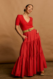 Model Katie wearing size 10 of the Bamboo Wrap Top in colour Cherry (Red), from the front, showing the whole outfit