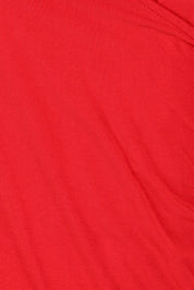 Product shot of the Bamboo Wrap Top in colour Cherry (Red), detail