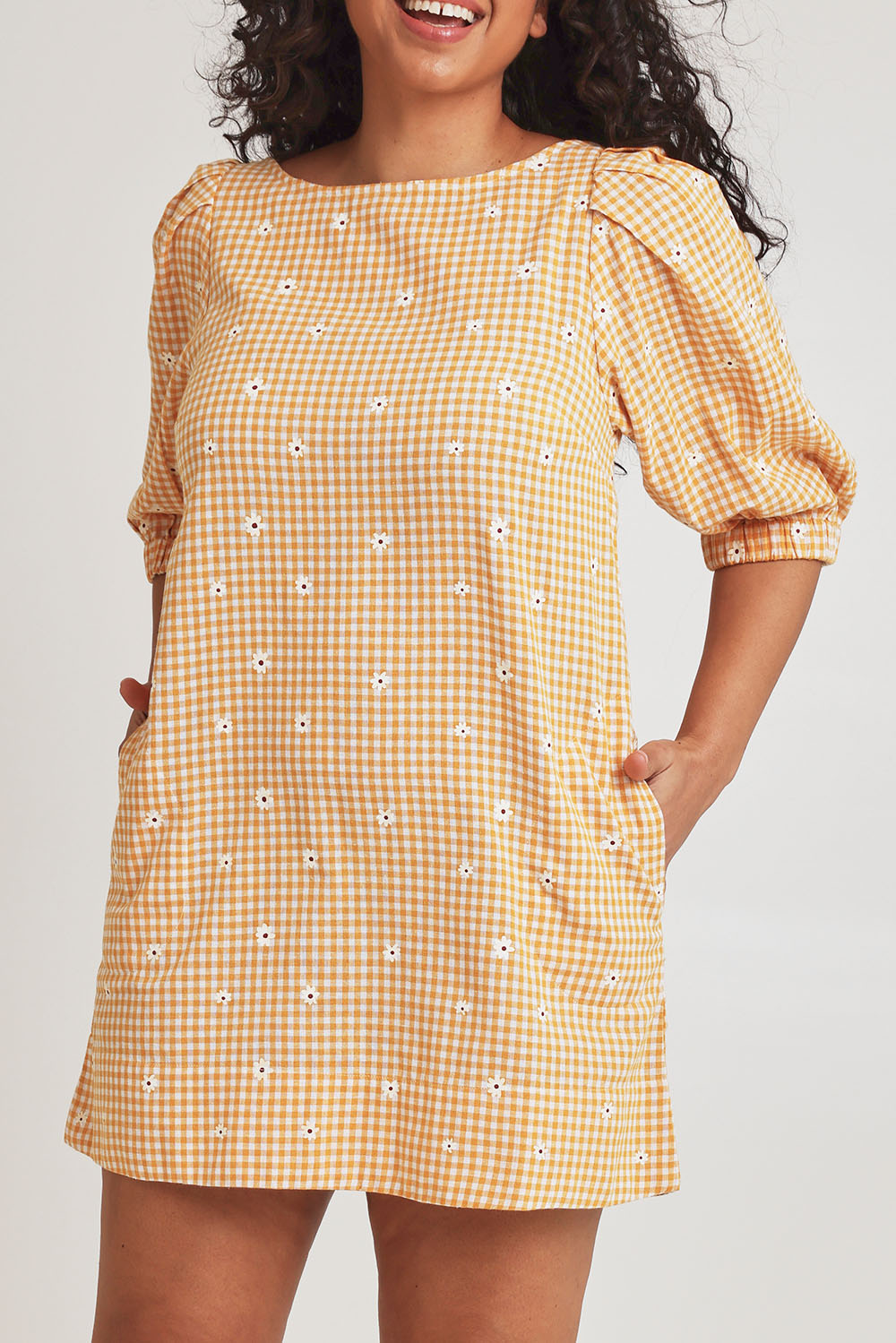 Model Terri-Leigh wearing size 14 of the Daisy Cotton Sundress in colour Daisycheck, from the front, cropped image