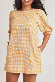 Model Terri-Leigh wearing size 14 of the Daisy Cotton Sundress in colour Daisycheck, from the front, cropped image