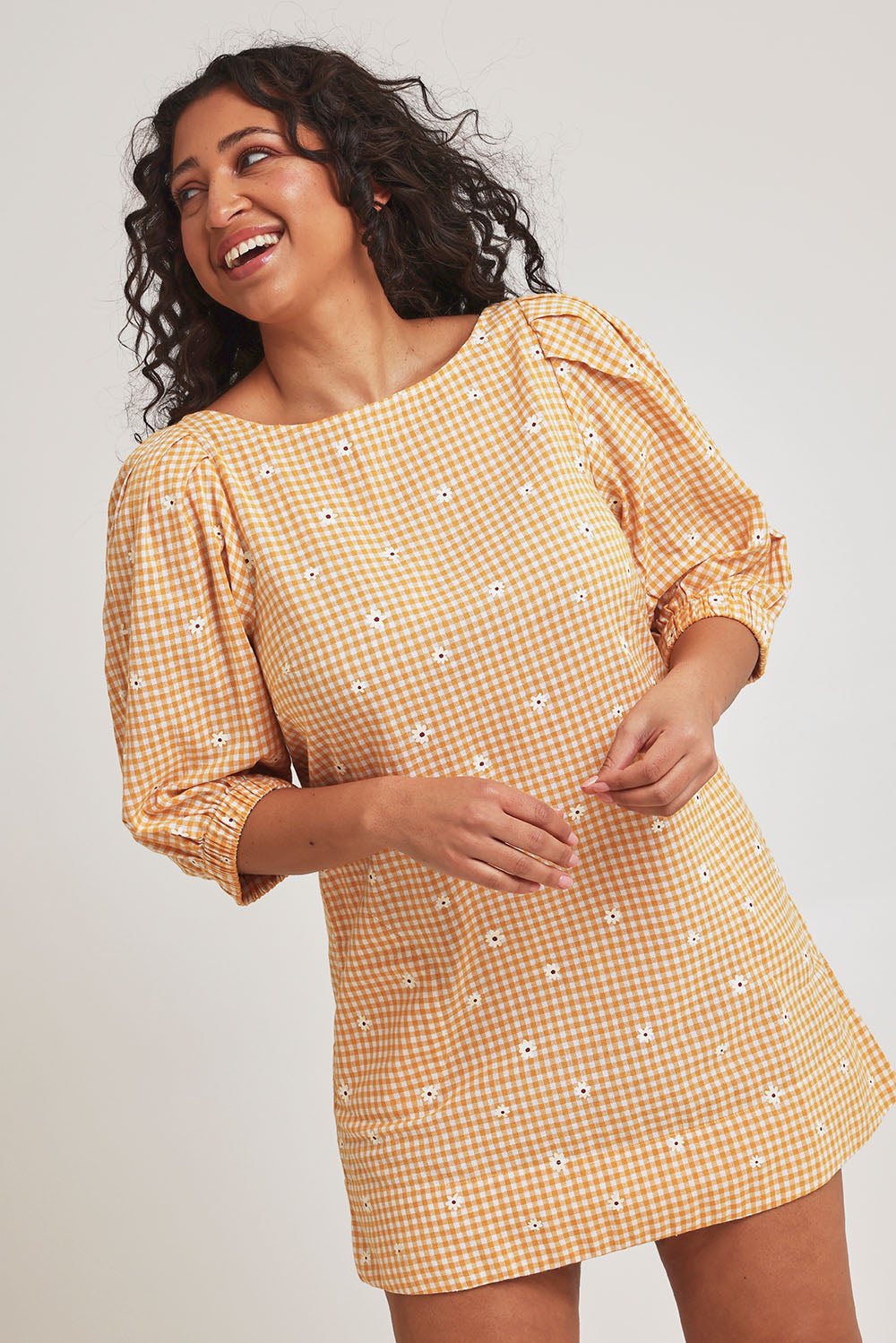 Model Terri-Leigh wearing size 14 of the Daisy Cotton Sundress in colour Daisycheck, from the front, cropped image