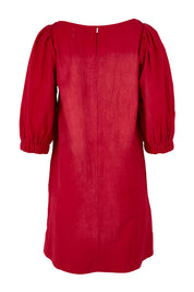 Product shot of the Puff Sleeve Cotton Dress in colour Ribbonred (Red), from the back
