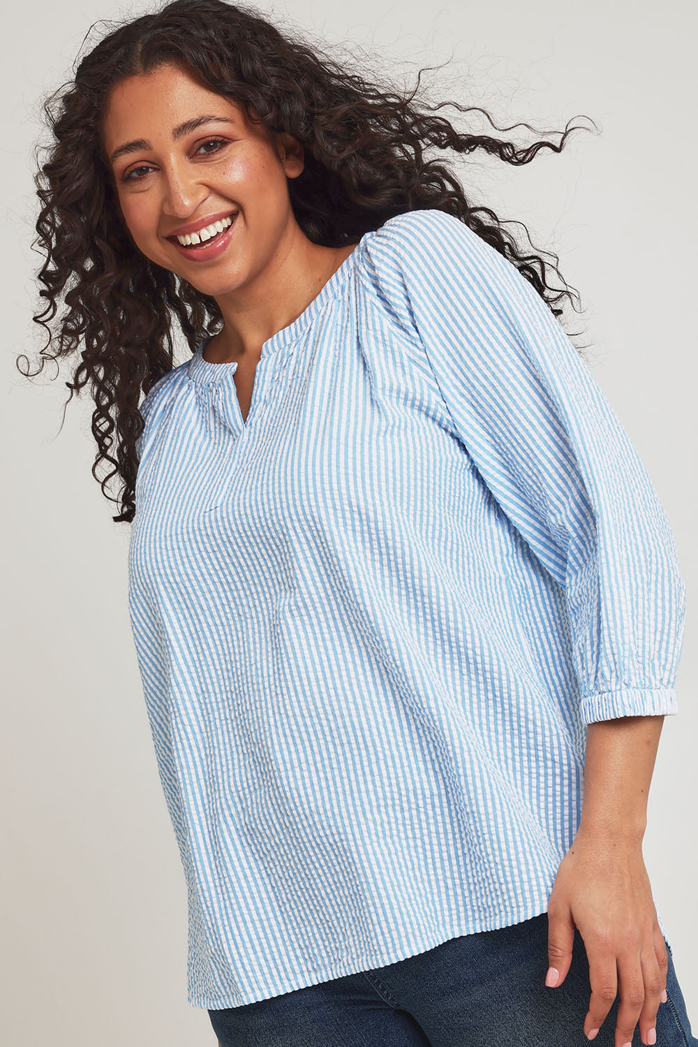 Model Terri-Leigh wearing size 14 of the Summer Stripe Cotton Blouse in colour Bluestripe (Blue), from the front, cropped image