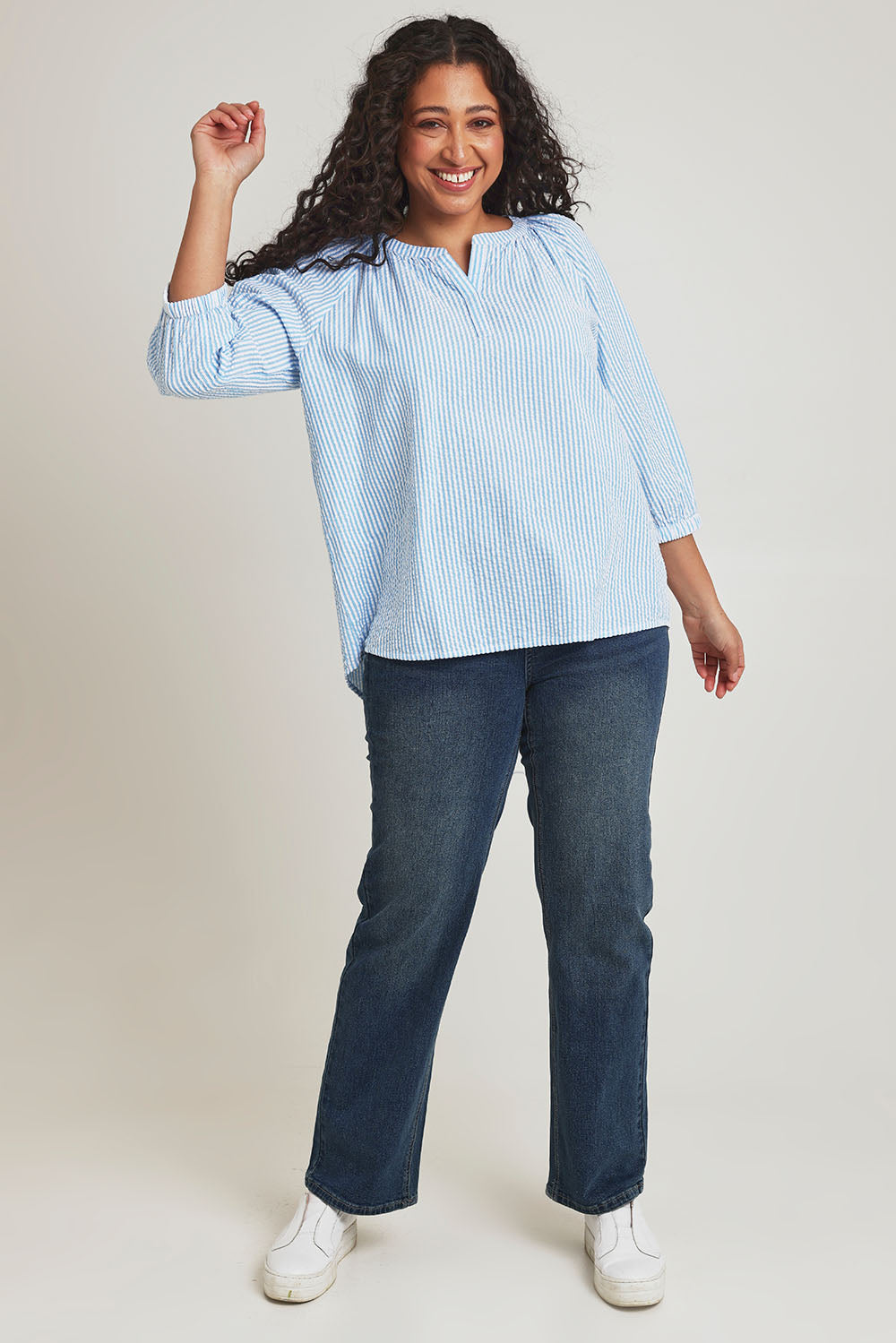 Model Terri-Leigh wearing size 14 of the Summer Stripe Cotton Blouse in colour Bluestripe (Blue), from the front, showing the whole outfit