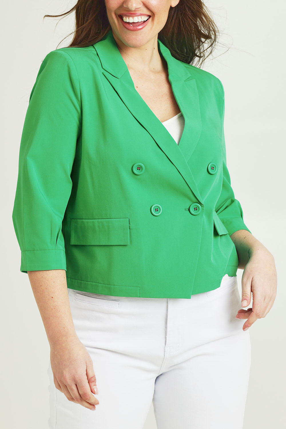 Model Jane wearing size 14 of the Double Breasted Blazer in colour Applegrn (Green), from the front, cropped image
