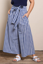 Model Georgiel wearing size 10 of the Cotton Waist Tie Pants – Bluewhite in colour Bluewhite, in a cropped view
