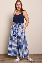 Model Georgiel wearing size 10 of the Cotton Waist Tie Pants – Bluewhite in colour Bluewhite, from the front