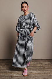 Model Katie wearing size 10 of the Cotton Waist Tie Pants in colour Gingham (Black), from the front, showing the whole outfit