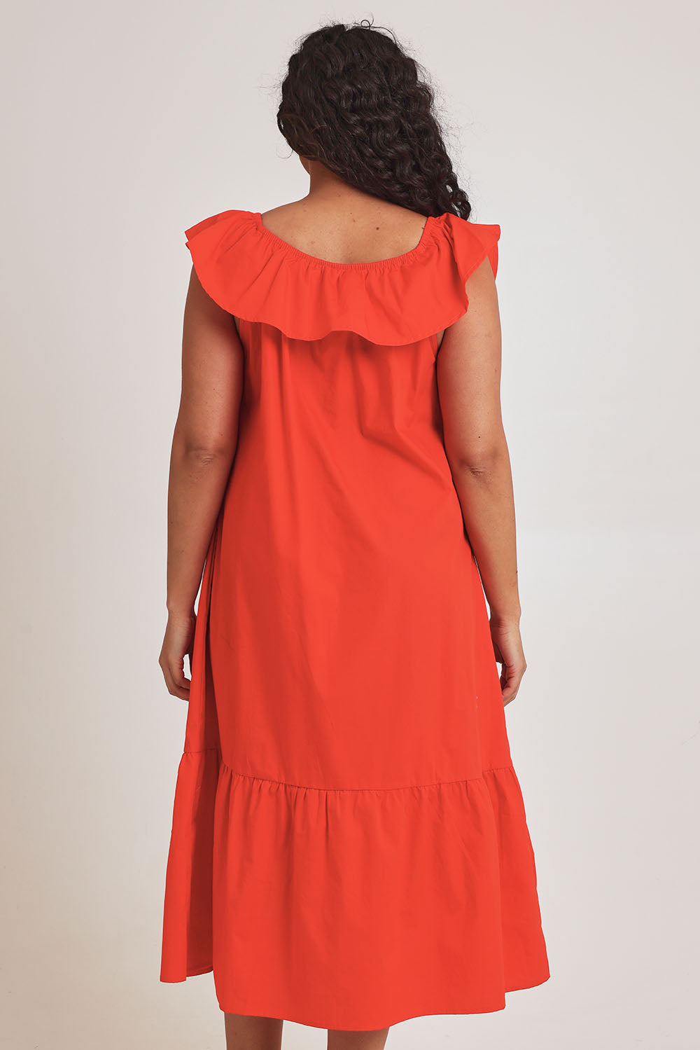 Model Terri-Leigh wearing size 14 of the On Or Off The Shoulder Cotton Dress in colour Flame (Red), from the back