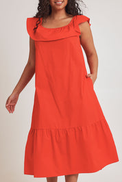 Model Terri-Leigh wearing size 14 of the On Or Off The Shoulder Cotton Dress in colour Flame (Red), from the front, cropped image