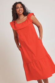 Model Terri-Leigh wearing size 14 of the On Or Off The Shoulder Cotton Dress in colour Flame (Red), from the front, cropped image