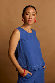 Model Katie wearing size 10 of the Scalloped Hem Cotton Tank in colour Palaceblue (Blue), from the front, showing the whole outfit