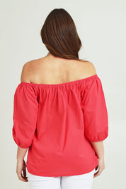 Model Jane wearing size 14 of the On Or Off The Shoulder Cotton Blouse in colour Hibiscus, from the back