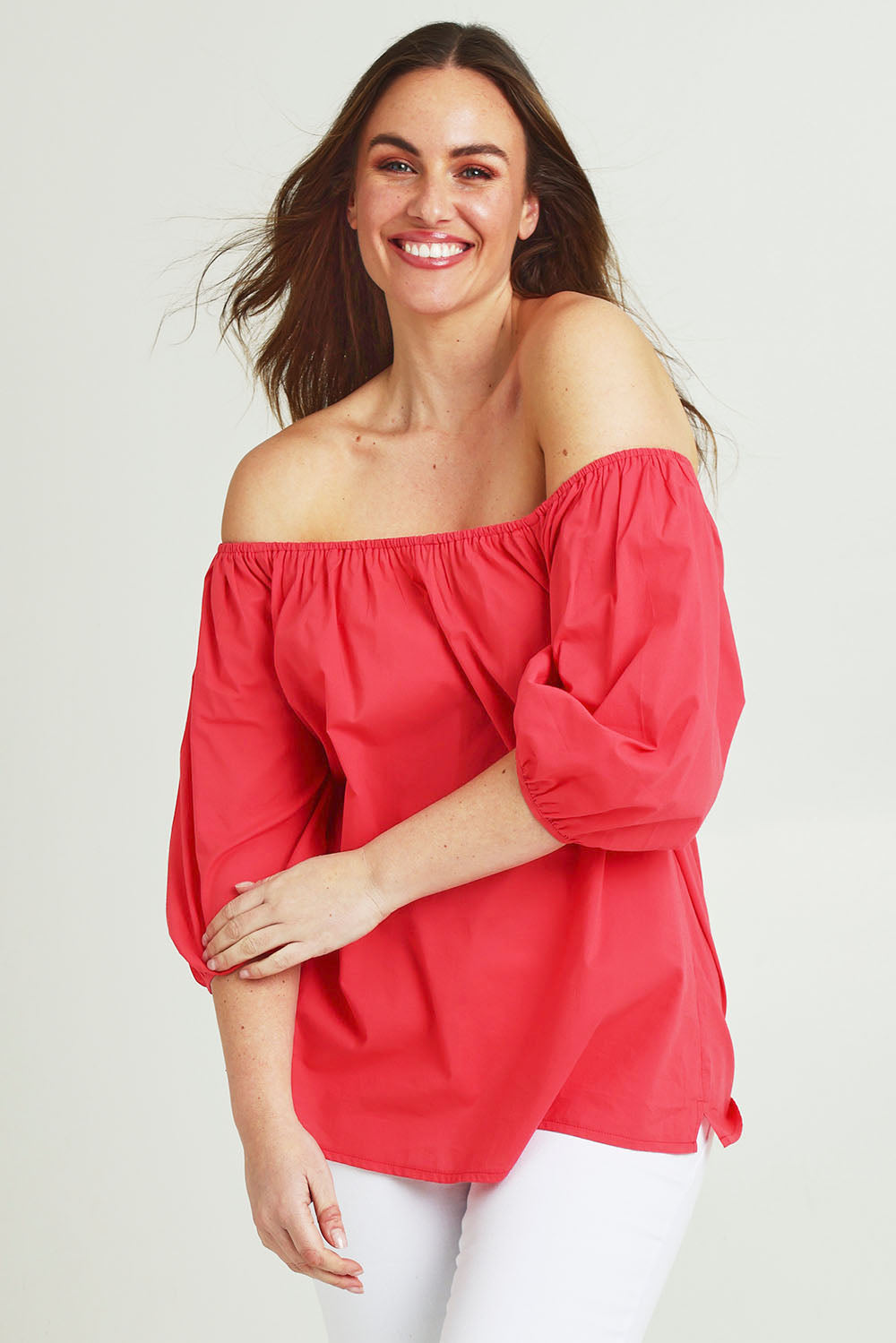 Model Jane wearing size 14 of the On Or Off The Shoulder Cotton Blouse in colour Hibiscus, from the front, cropped image