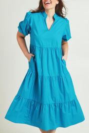 Model Jane wearing size 14 of the Tiered Cotton Dress in colour Jewel (Blue), from the front, cropped image