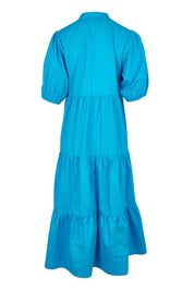 Product shot of the Tiered Cotton Dress in colour Jewel (Blue), from the back