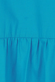 Product shot of the Tiered Cotton Dress in colour Jewel (Blue), detail