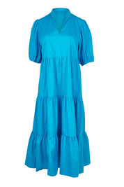Product shot of the Tiered Cotton Dress in colour Jewel (Blue), from the front