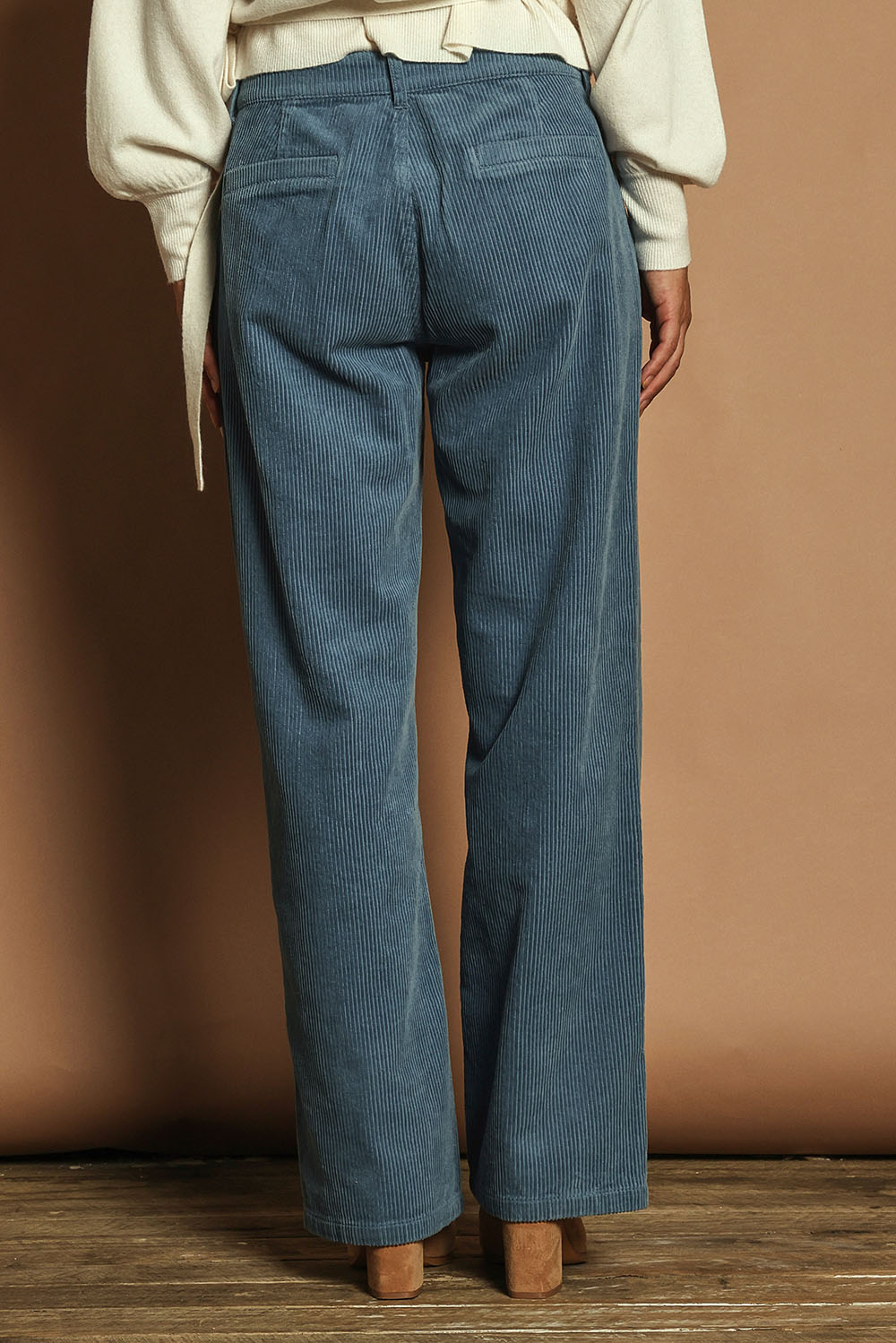 Model Katie wearing size 10 of the Cotton Blend Corduroy Pant in colour Arcticblue (Blue), from the back