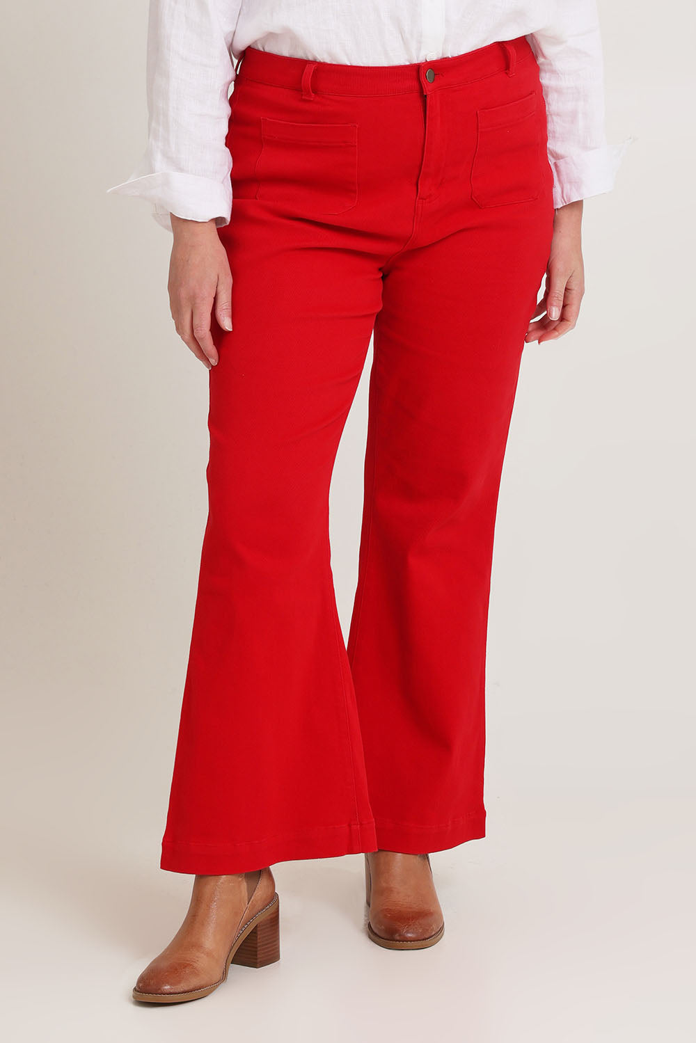 Model Chanel wearing size 16 of the Denim Patch Pocket Jean in colour Red (Red), from the front, cropped image