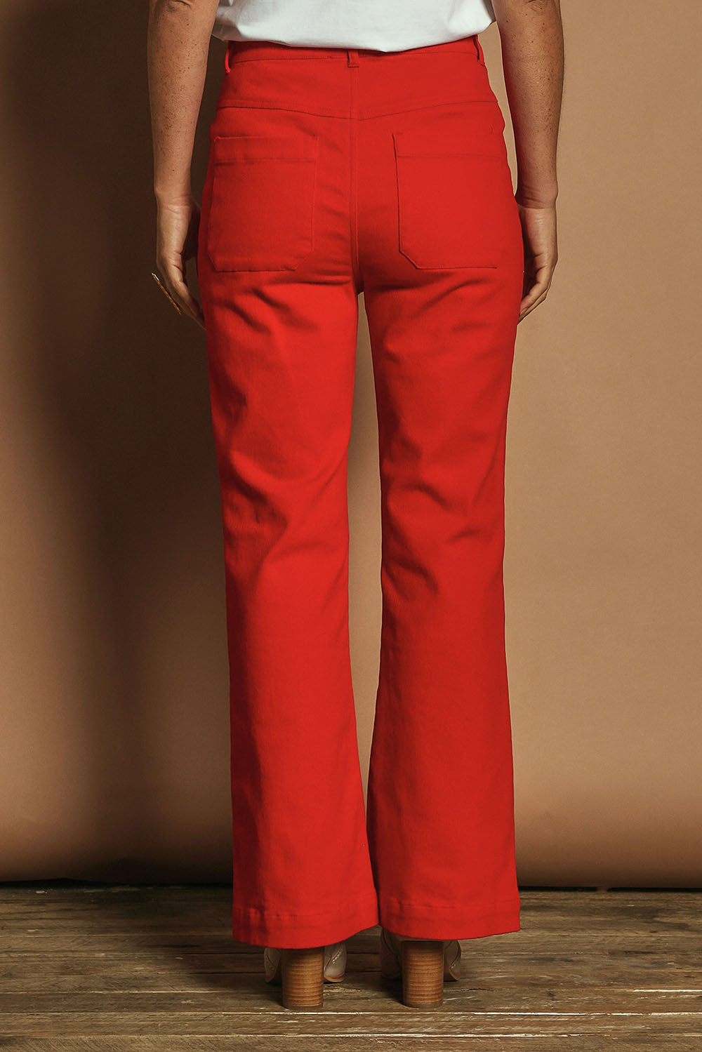 Model Katie wearing size 10 of the Denim Patch Pocket Jean in colour Red (Red), from the back