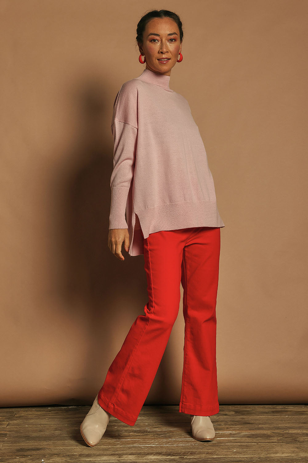 Model Katie wearing size 10 of the Denim Patch Pocket Jean in colour Red (Red), from the front, showing the whole outfit